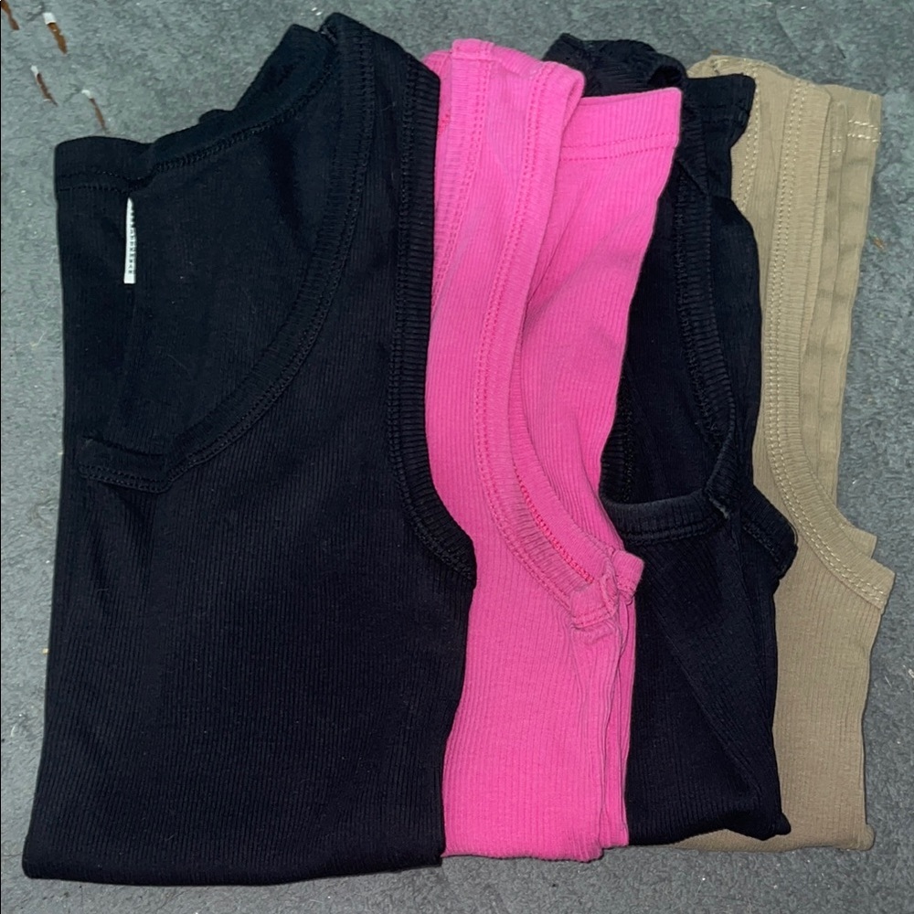 Tag Above 4 Pack of Tank Tops